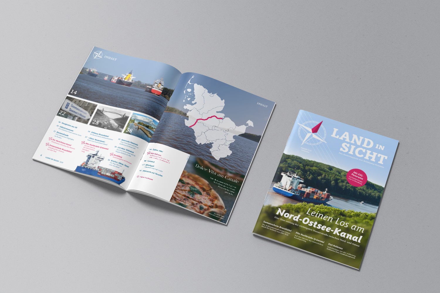Mockup of “LAND IN SICHT” magazine in front of a gray background